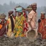 Through local initiatives, WFP supports the improvement of women’s access to food. The women receive food rations in exchange for work or training that benefit communities. Activities include building schools or sanitary facilities. Photo: WFP/Chu Cancan