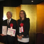 Toshizo Ido, Governor of Hyogo Prefecture, receives a certificate appointment as a Campaign Champion for Making Cities Resilient (January 2011) / UNISDR Photo